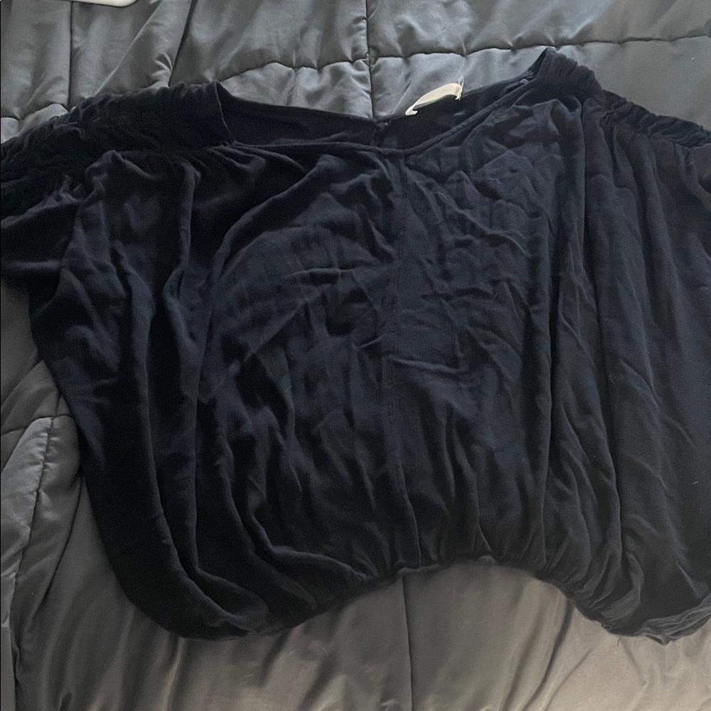 Mustard Seed Black Blouse with gathered bottom and ruched  sleeves.